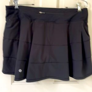 black lululemon tennis shirt- worn 1 time. very good shape - layered in back